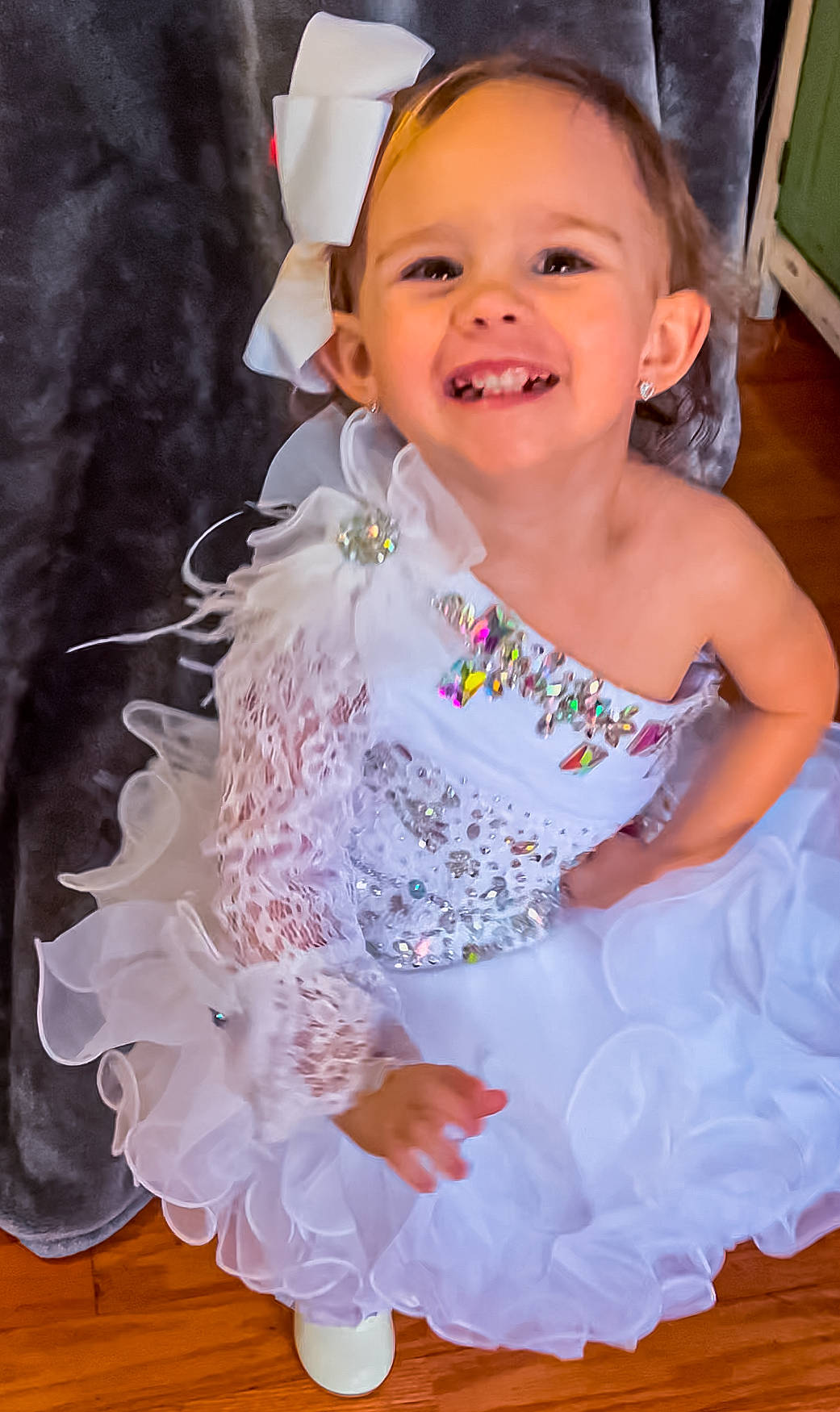 Oaklynn is registered to the contest to win money with this photo: baby_toddler_clothing, beauty, child, dress, embellishment, event, face, facial_expression, formal_wear, fun, hair_accessory, happy, head, headpiece, iris, joy, magenta, person, pink, skin