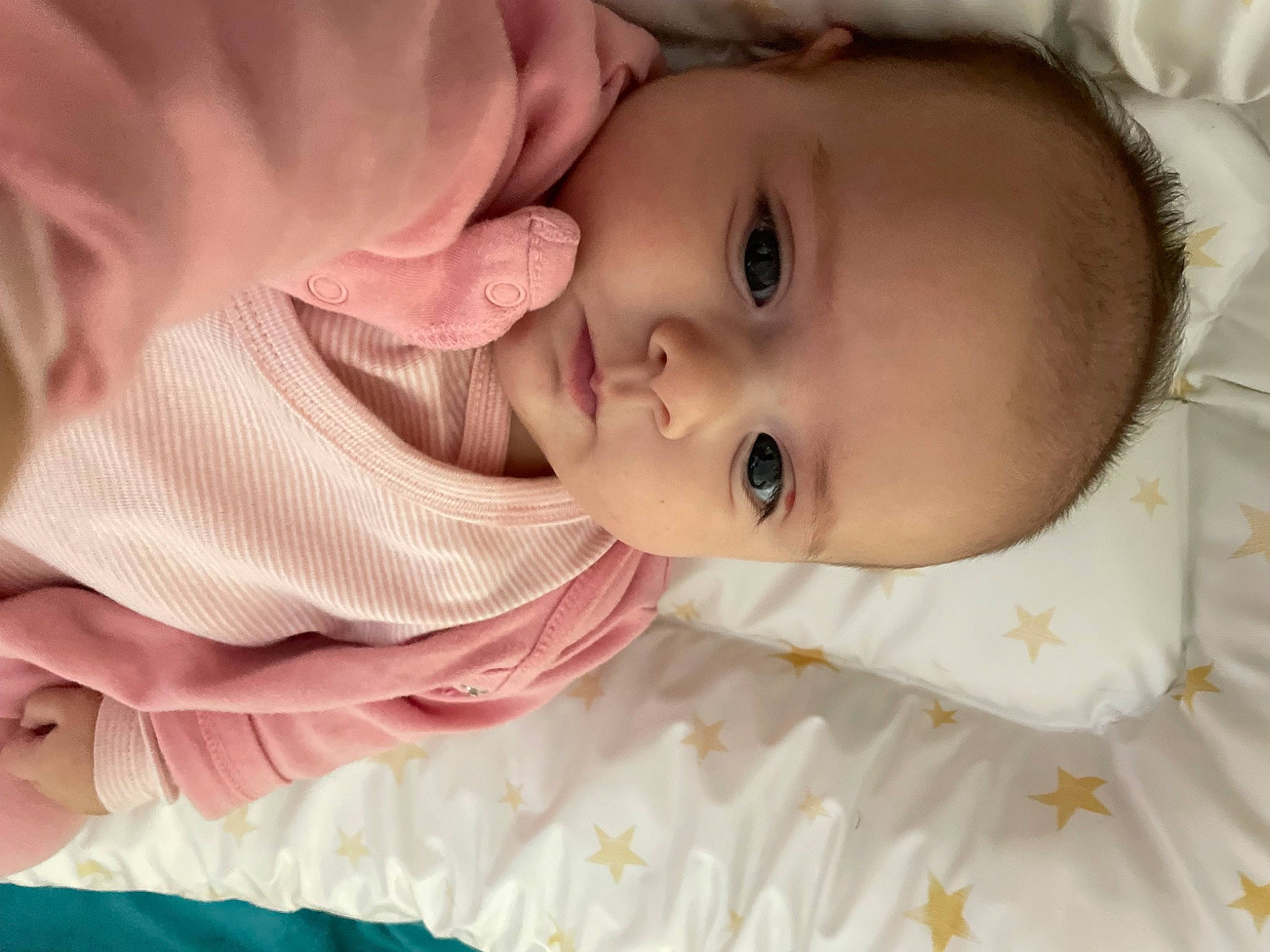 Laïa participe au concours pour gagner de l'argent avec cette photo : baby, baby_toddler_clothing, cheek, child, comfort, dress, eyebrow, eyelash, happy, human_body, iris, lip, mouth, nose, organ, person, pink, skin, sleeve, smile