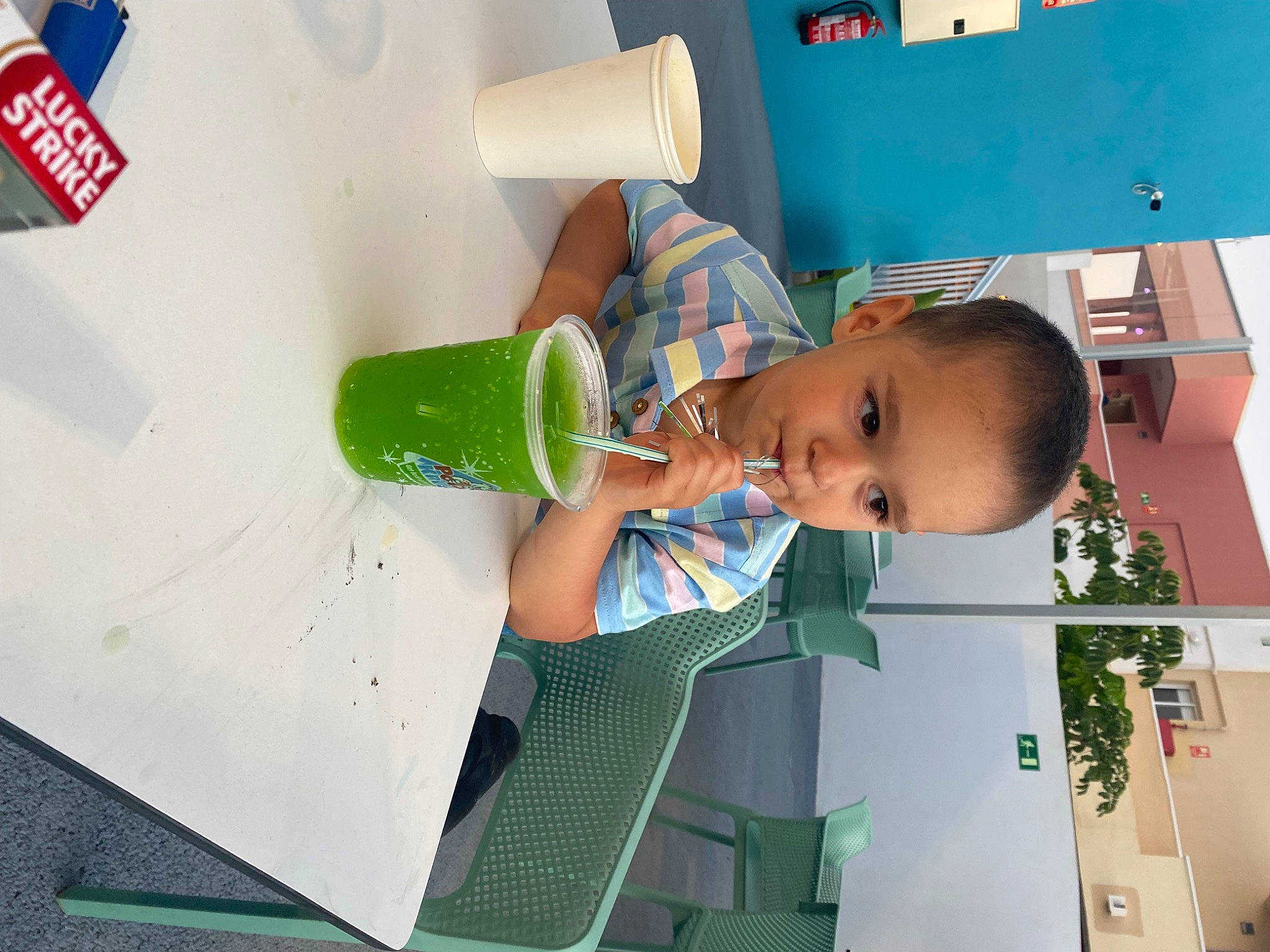 Lucas joined the competition — help win amazing prizes! art, baby, baby_products, bottle, building, child, drinkware, leisure, logo, paint, paper_towel, person, plant, plastic, plastic_bottle, play, room, toddler, visual_arts, water