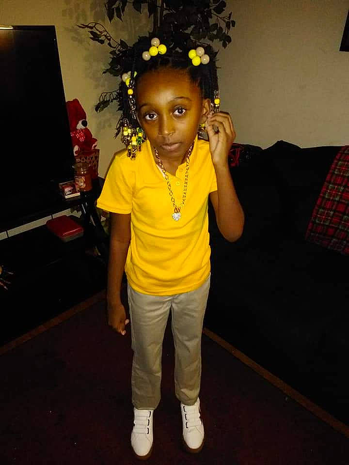 Canise joined the competition — help win amazing prizes! afro, child, cool, costume, fun, hair_accessory, head, joint, party, person, shoe, shoulder, standing, t_shirt, toddler, world, yellow