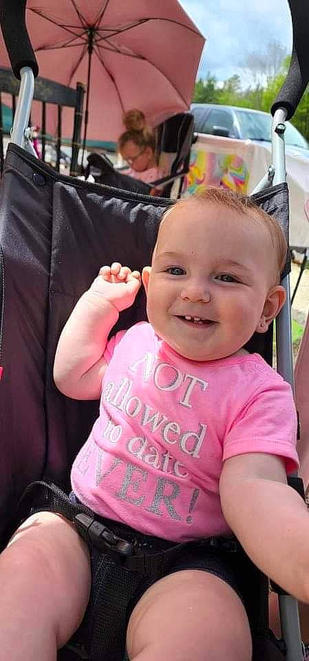 Brynlee joined the competition — help win amazing prizes! baby, baby_products, baby_toddler_clothing, cheek, child, chin, event, finger, fun, gesture, happy, joy, leisure, magenta, person, pink, sitting, skin, smile, t_shirt