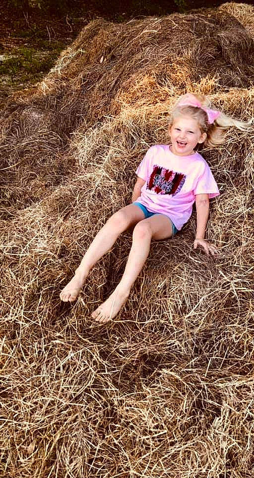 Ray'Lynn joined the competition — help win amazing prizes! barefoot, blond, brown_hair, child, field, flash_photography, fun, grass, grass_family, grassland, hair, happy, human_leg, joy, meadow, people_in_nature, person, sitting, soil, t_shirt