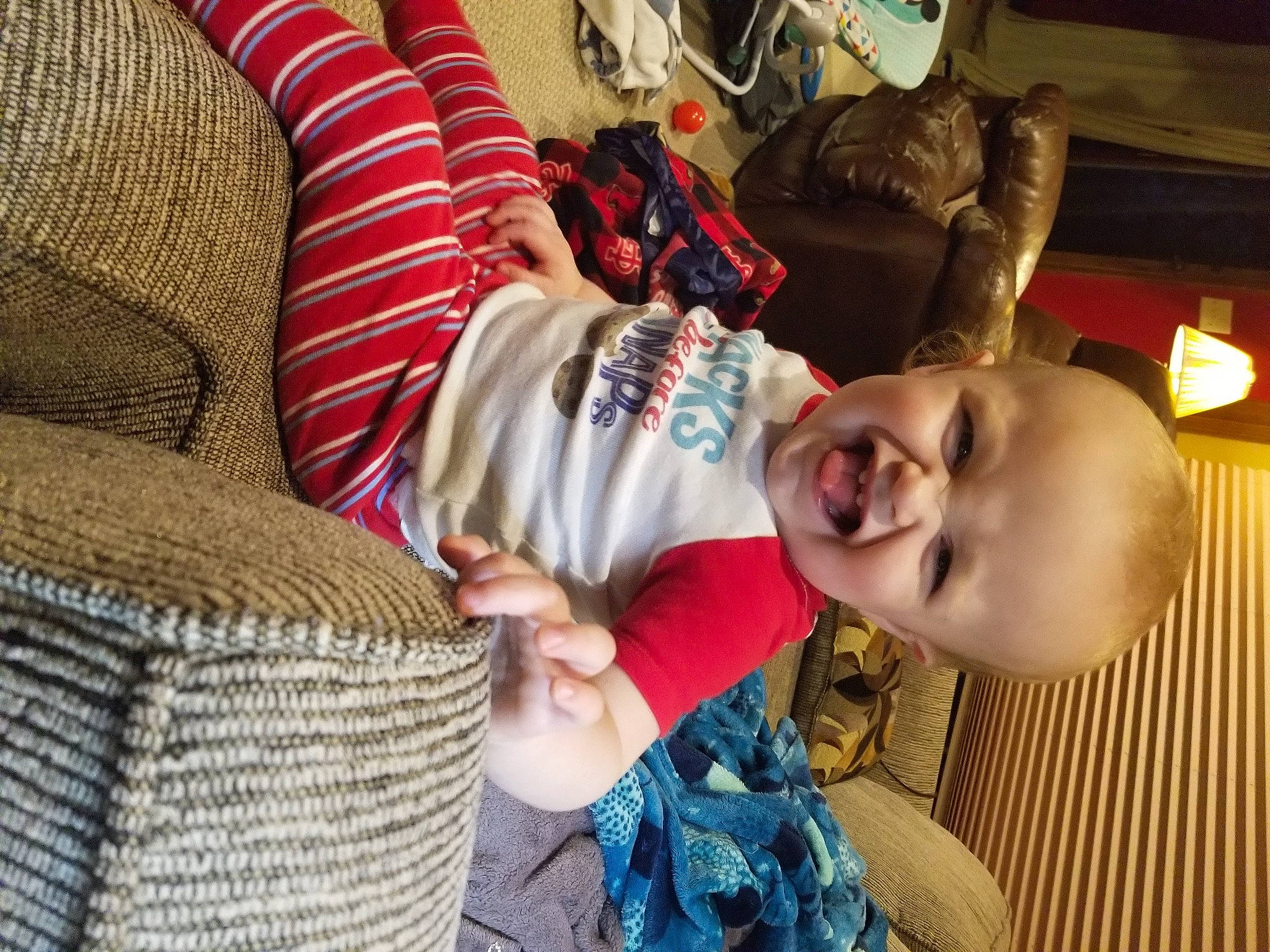 Brandon joined the competition — help win amazing prizes! baby, baby_toddler_clothing, basket, child, comfort, couch, fun, happy, leisure, linens, mammal, pattern, person, room, sitting, smile, t_shirt, toddler, vacation, vertebrate