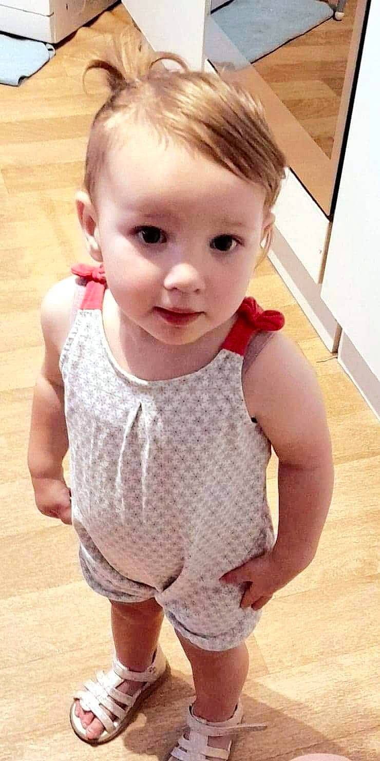 Eleanor participe au concours pour gagner de l'argent avec cette photo : arm, baby_toddler_clothing, cheek, chin, clothing, dress, eye, eyelash, face, hair, head, human_body, joint, lip, neck, nose, person, shoulder, skin, sleeve