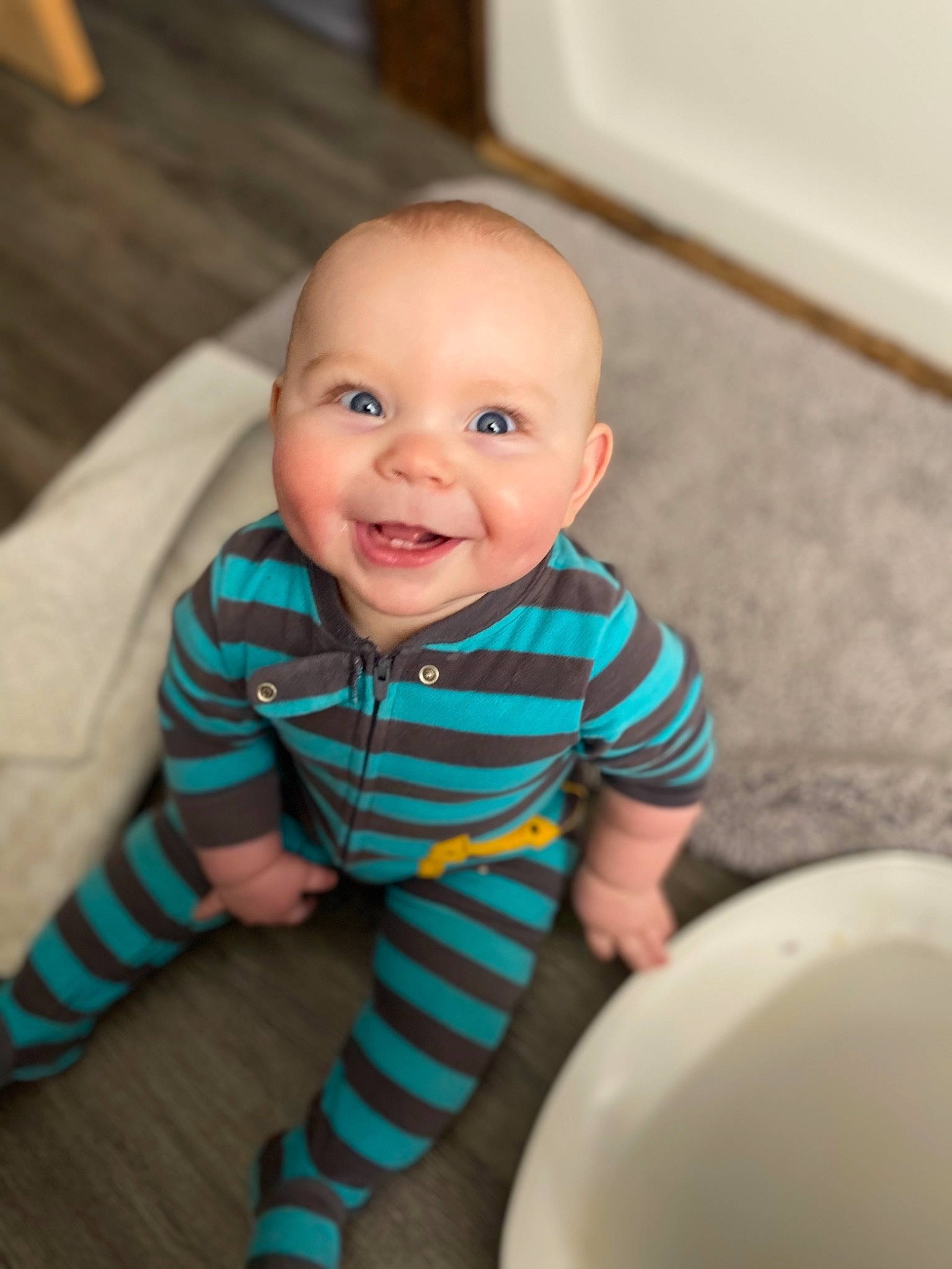 Kendrick joined the competition — help win amazing prizes! arm, baby, baby_toddler_clothing, cheek, child, comfort, eye, floor, flooring, fun, happy, hardwood, iris, joy, person, skin, sleeve, smile, t_shirt, toddler