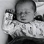 baby, newborn, sleeping, blanket, onesie, animal_print, infant, cozy, monochrome, peaceful, bed, portrait, cute, child, face, hand, soft, rest, indoors, young