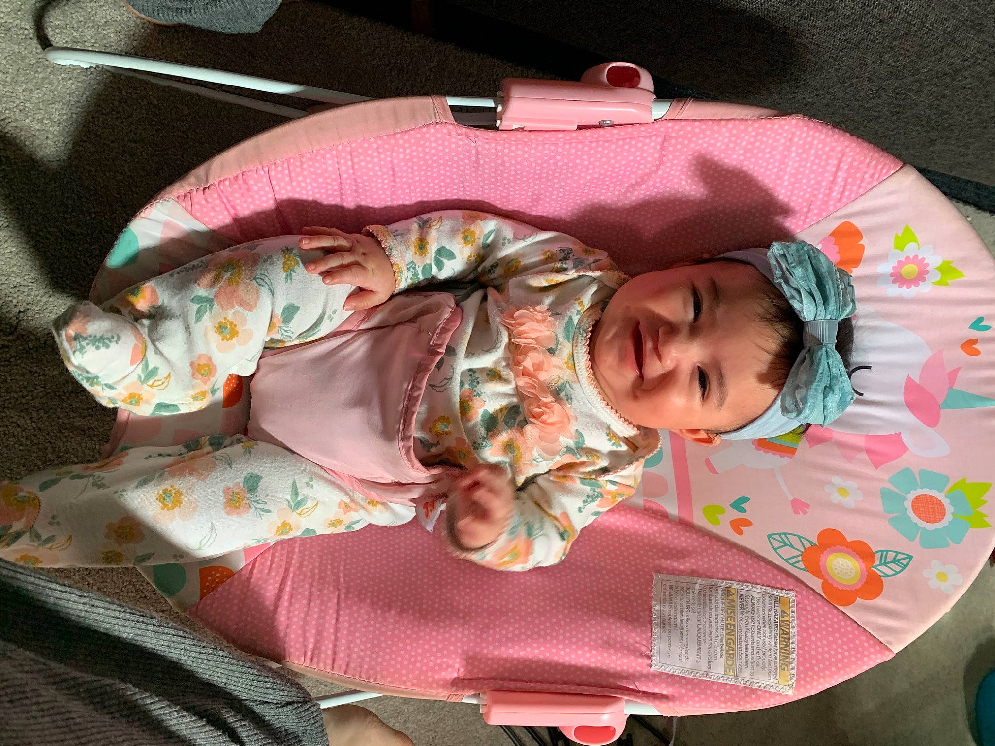 Dalia is registered to the contest to win money with this photo: baby, baby_products, baby_toddler_clothing, car_seat, child, comfort, fashion_accessory, joy, linens, pattern, person, pink, room, sleep, sleeve, smile, toddler