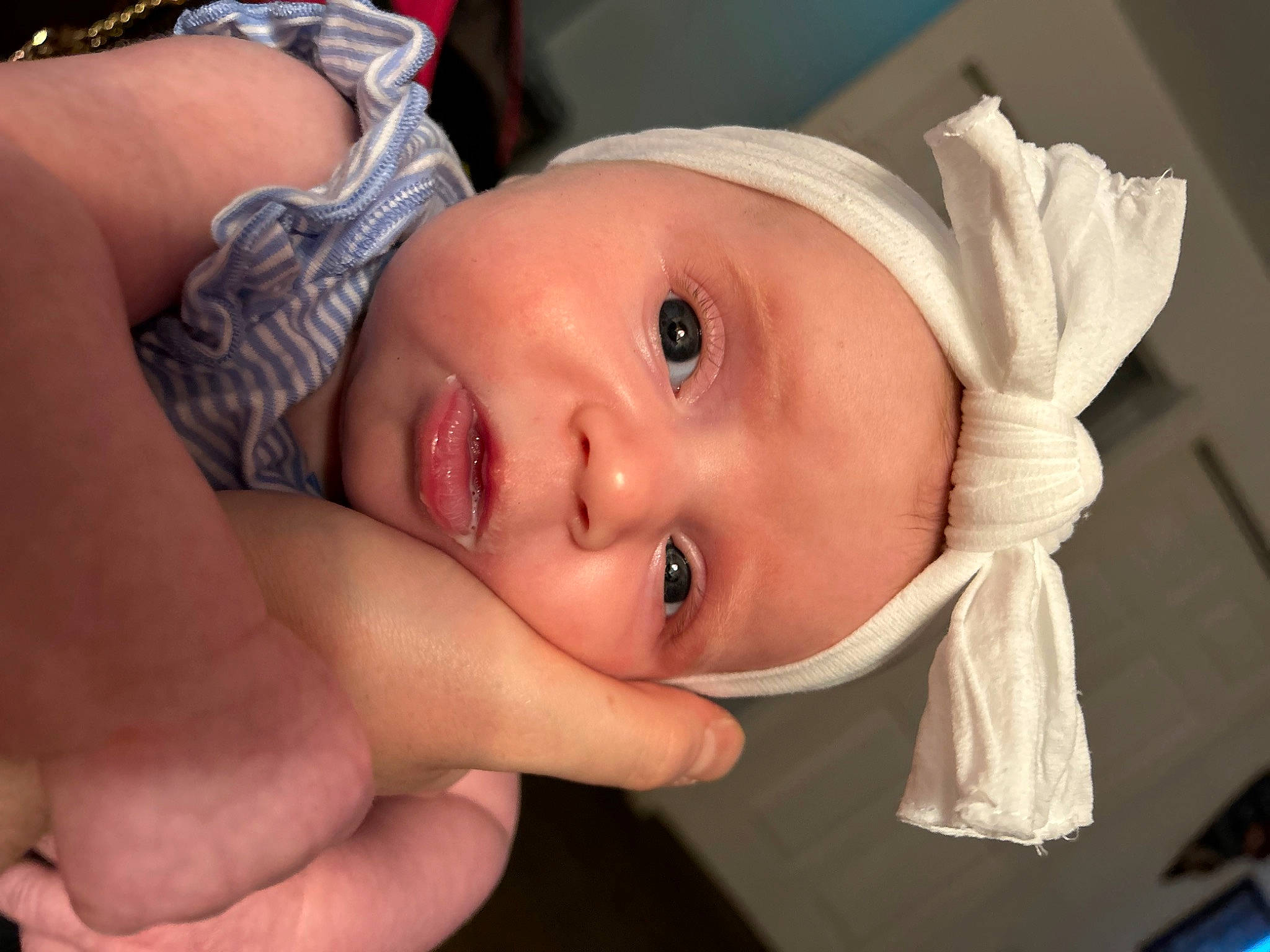 Hazellee is registered to the contest to win money with this photo: baby, baby_toddler_clothing, cheek, chest, child, eye, eyelash, finger, gesture, hand, happy, hat, lip, mouth, nail, nose, person, skin, smile, thumb