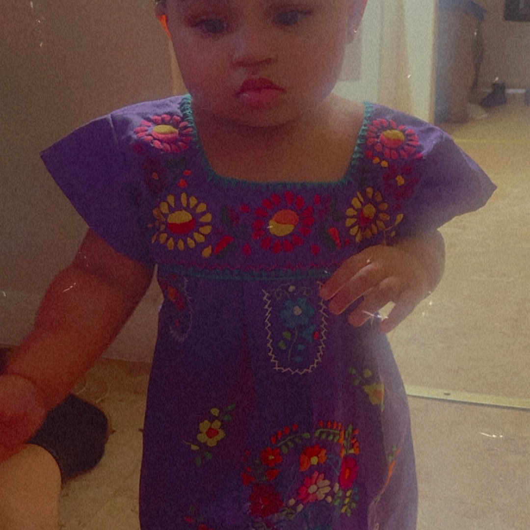 Khyndall joined the competition — help win amazing prizes! accessories, baby, blouse, clothing, costume, dress, face, footwear, hat, head, indoors, jewelry, necklace, pants, person, photography, portrait, purple, shoe, t_shirt