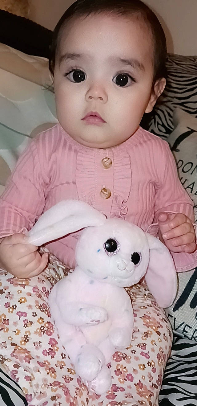 Azariah joined the competition — help win amazing prizes! baby, baby_toddler_clothing, cheek, child, eyelash, face, happy, head, lip, nose, organ, person, photograph, pink, skin, sleeve, teddy_bear, textile, toddler, toy