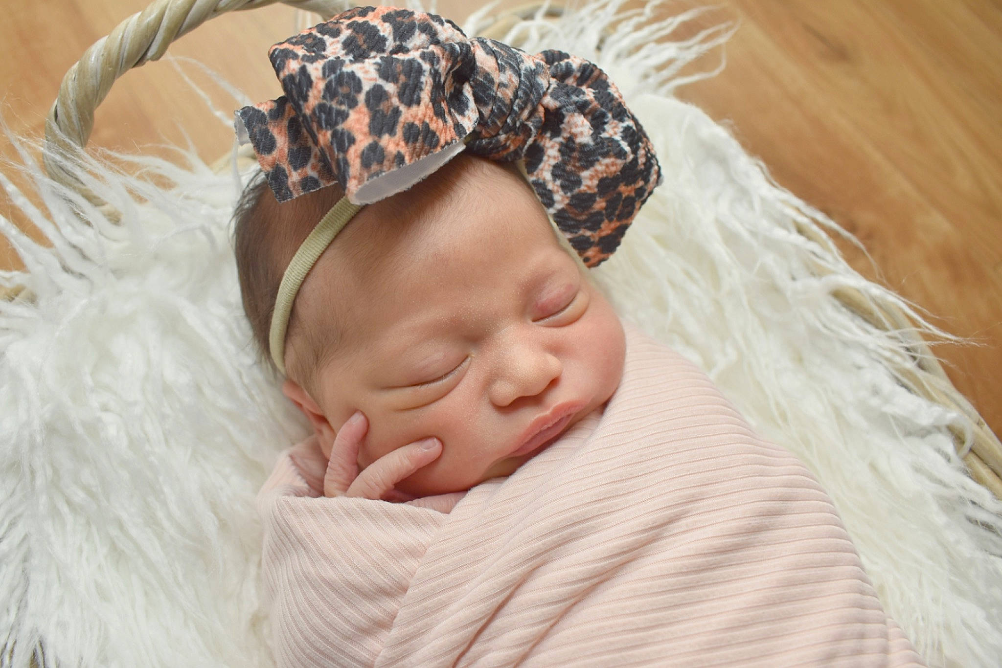 Tinsley is registered to the contest to win money with this photo: baby, baby_sleeping, baby_toddler_clothing, child, comfort, ear, eyebrow, fashion_accessory, grass, hair_accessory, happy, head, headband, headgear, headpiece, linens, neck, pattern, person, skin