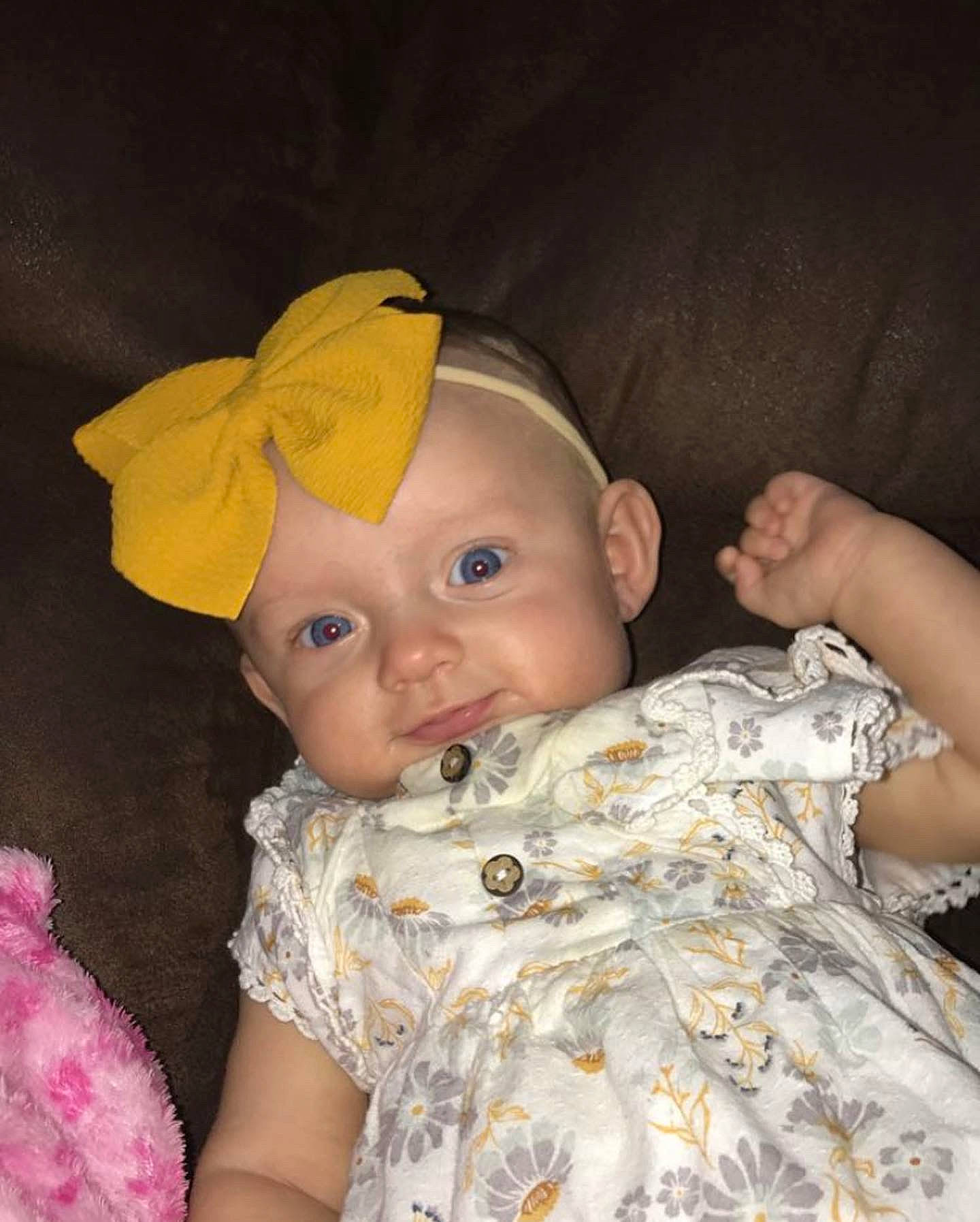 Oaklyn is registered to the contest to win money with this photo: baby, baby_toddler_clothing, cap, cheek, child, costume_hat, dress, ear, facial_expression, fashion_accessory, happy, hat, headwear, iris, linens, mammal, pattern, person, skin, sleeve