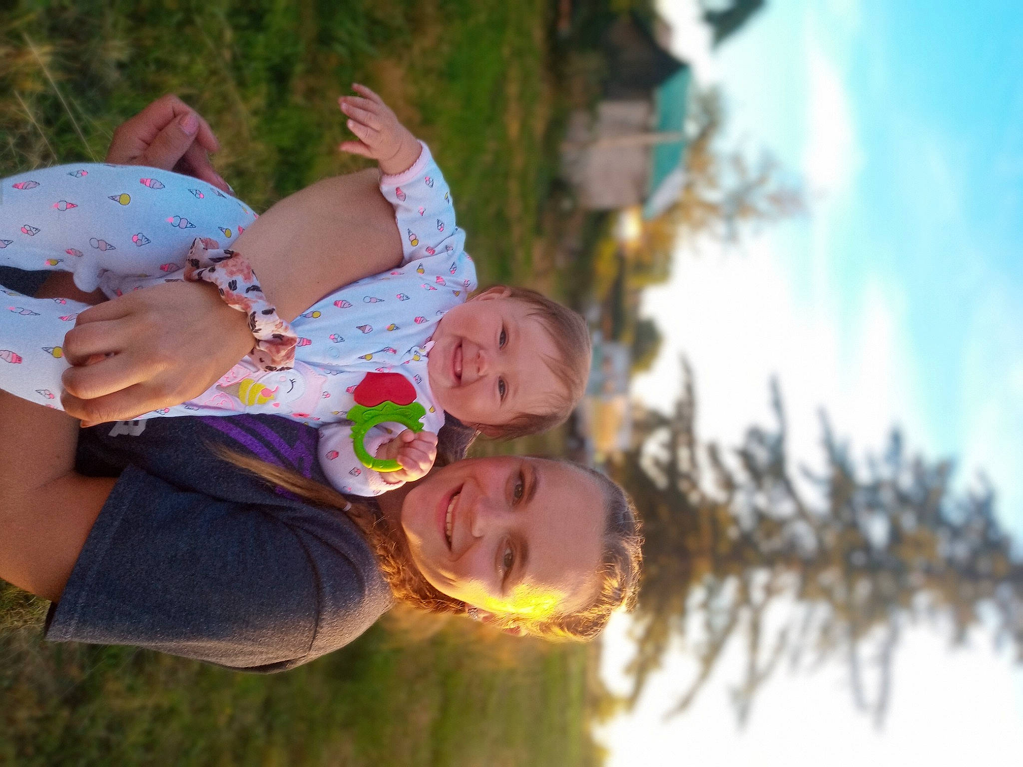 Miah is registered to the contest to win money with this photo: abdomen, baby, child, cloud, event, fun, gesture, grass, grass_family, happy, joy, leisure, love, people_in_nature, person, plant, sky, smile, sunlight, toddler