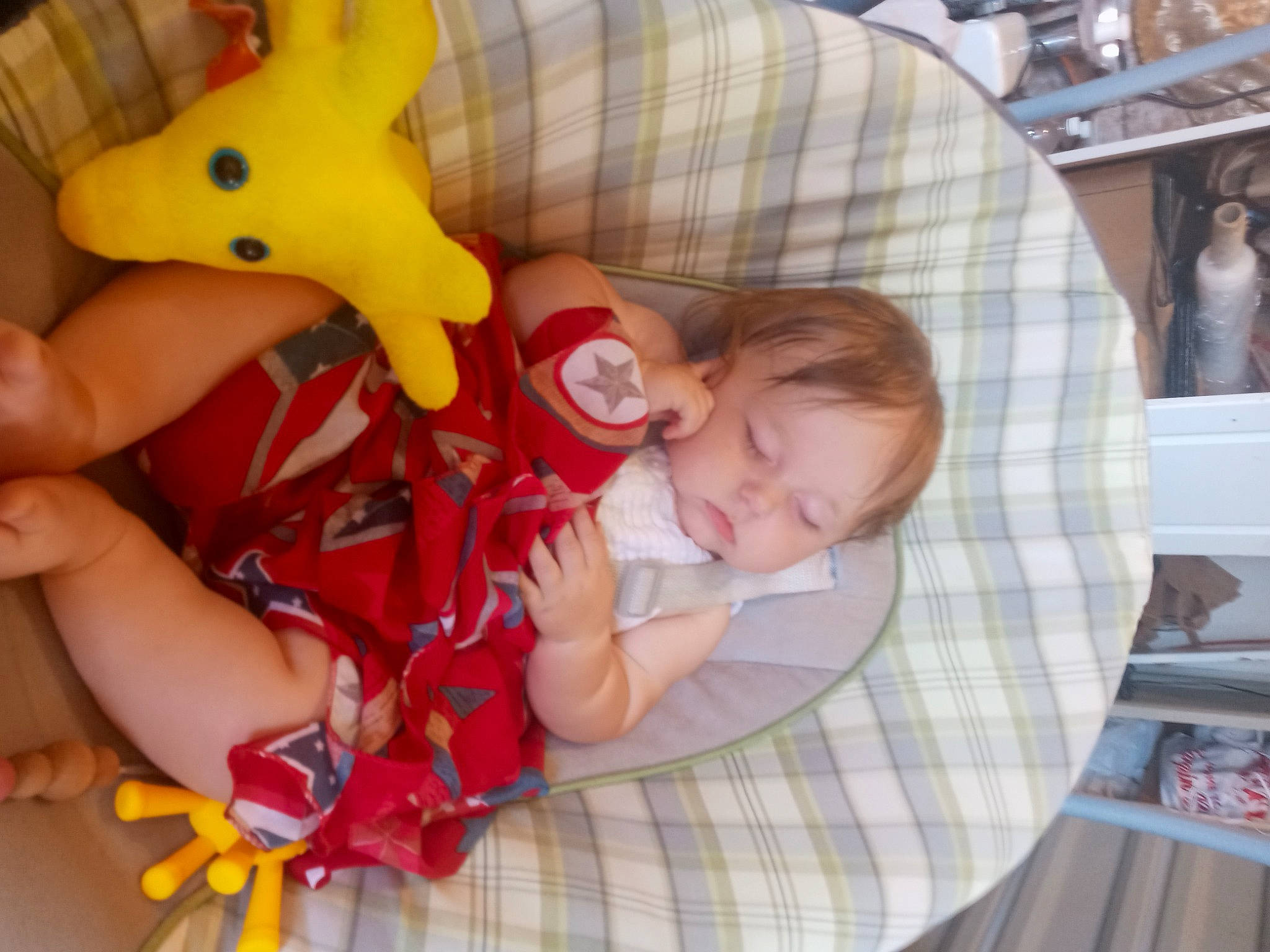 Miah joined the competition — help win amazing prizes! baby, baby_products, baby_toddler_clothing, baby_toys, child, comfort, couch, fun, hand, happy, lap, nail, pattern, person, plaid, product, room, tartan, textile, toddler