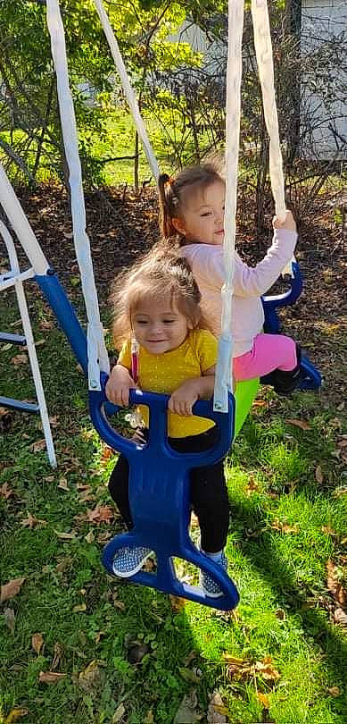 Luna joined the competition — help win amazing prizes! baby_toddler_clothing, botany, face, grass, happy, head, joy, leaf, leisure, nature, outdoor_play_equipment, people_in_nature, person, plant, recreation, smile, summer, swing, toddler, tree