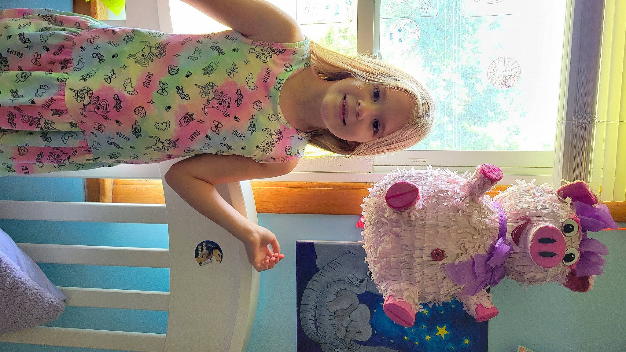 Sophie is registered to the contest to win money with this photo: art, child, fur, green, happy, human_leg, joy, linens, magenta, pattern, person, pink, product, purple, room, stuffed_toy, textile, thigh, toddler, toy