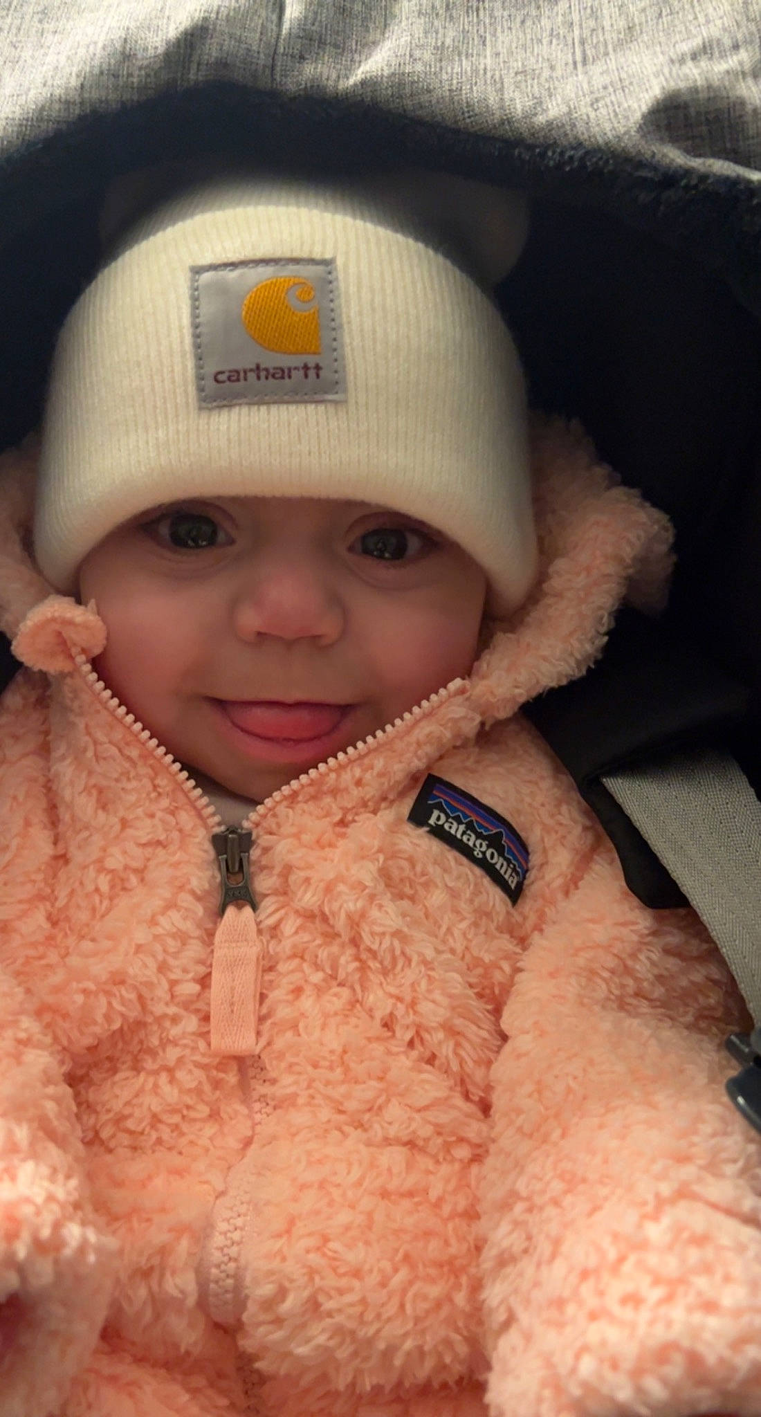 Alex is registered to the contest to win money with this photo: baby, cap, cheek, child, close_up, eye, eyebrow, fur, fur_clothing, happy, headgear, headwear, jacket, joy, knit_cap, lip, nose, outerwear, person, skin