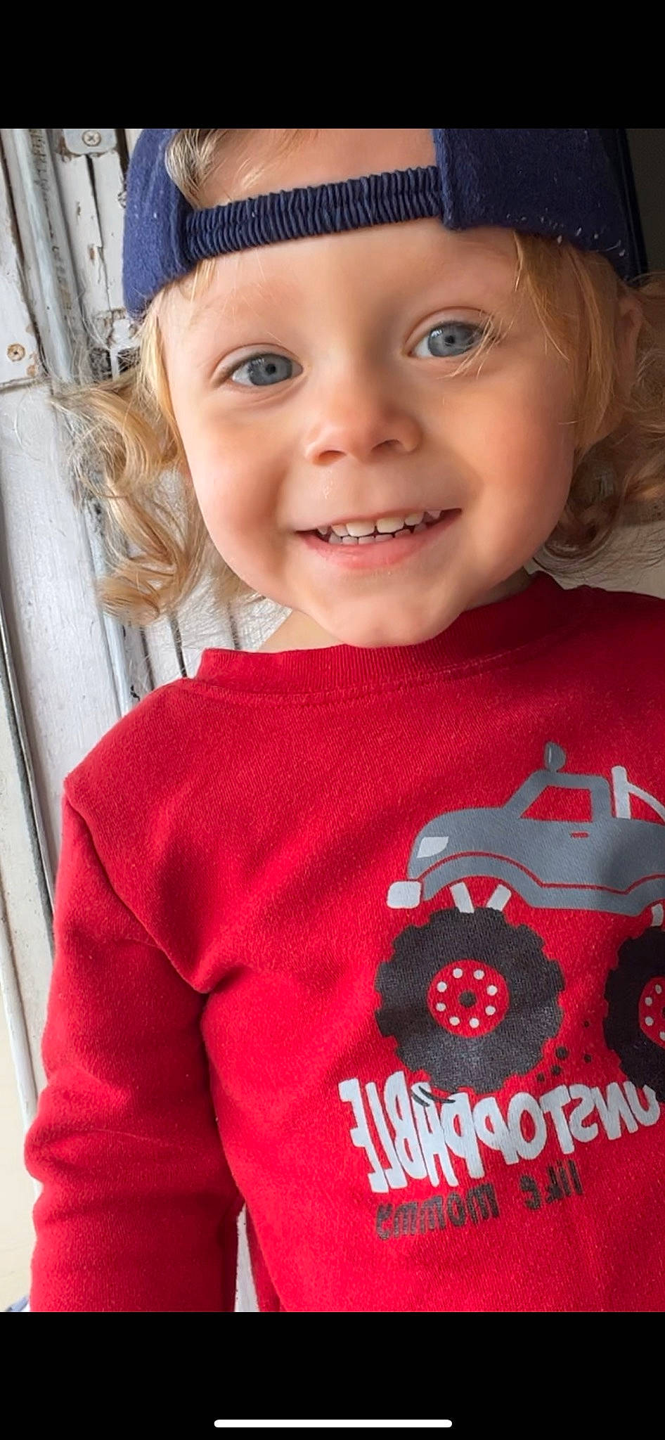 Kaidyn is registered to the contest to win money with this photo: baby_toddler_clothing, baseball_cap, blue, cap, child, cool, electric_blue, eye, face, happy, headwear, joy, organ, outerwear, person, pink, red, skin, sleeve, smile