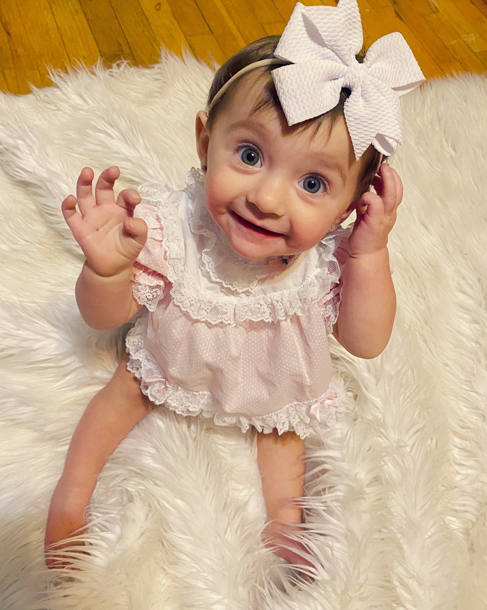 Huntleigh is registered to the contest to win money with this photo: baby, baby_toddler_clothing, cheek, child, costume, ear, eye, face, finger, hair_accessory, hand, head, headgear, headpiece, headwear, joy, organ, person, pink, product