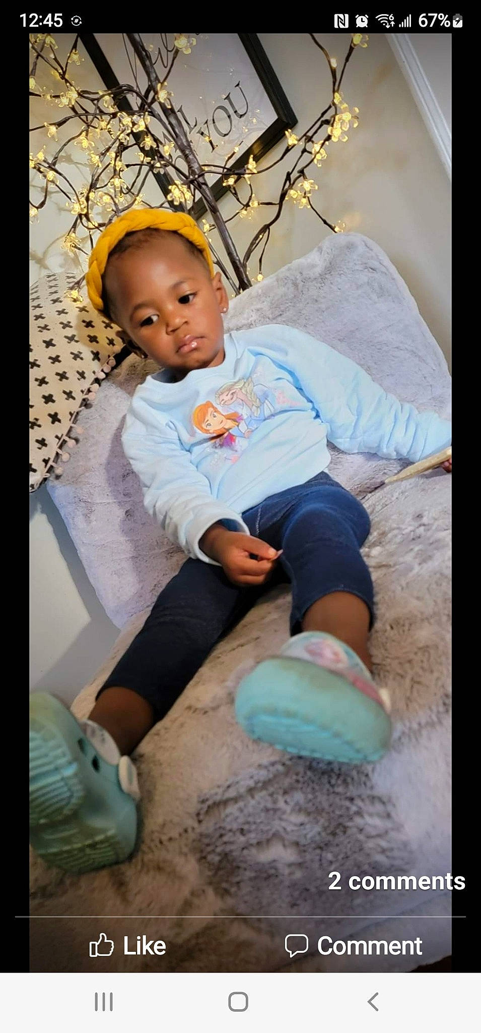 Camille is registered to the contest to win money with this photo: adaptation, baby, baby_toddler_clothing, child, cool, facial_expression, flash_photography, fun, grass, happy, leisure, mouth, person, pink, play, shorts, sitting, sleeve, stock_photography, t_shirt