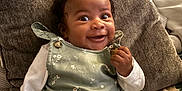 Amina joined the competition — help win amazing prizes! baby, babylaughing, bodypart, couch, cushion, cutlery, face, finger, furniture, hand, happy, head, homedecor, linen, person, photography, pillow, portrait, smile, spoon