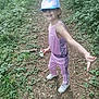 child, girl, outdoor, forest, path, flower, glasses, cap, pink_outfit, sneakers, smile, nature, greenery, tree, leaves, dirt_path, playful, happy, person, casual_clothing
