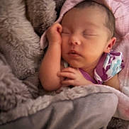 Amethyst is registered to the contest to win money with this photo: baby, blanket, child, clothing, comfort, cozy, cute, face, hand, hood, indoor, infant, peaceful, pink, portrait, resting, sleeping, soft, toddler, warm