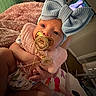 Amethyst joined the competition — help win amazing prizes! baby, bed, blanket, blue_bow, clothing, comfort, cute, decor, face, hand, headband, indoors, infant, living_room, pacifier, person, sleepwear, soft_texture, television, young_child
