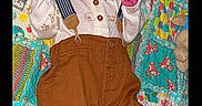 Jackson joined the competition — help win amazing prizes! baby, child, clothing, colorful, cozy, cute, fabric, face, fox_pattern, indoors, infant, lying_down, newborn, pants, patterned, quilt, sleepy, soft, suspenders, toddler