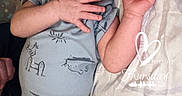 Jackson joined the competition — help win amazing prizes! baby, bed, blanket, child, cute, face, hand, heart, indoors, infant, lying_down, newborn, onesie, pattern, peaceful, resting, skin, sleeping, soft, text_overlay