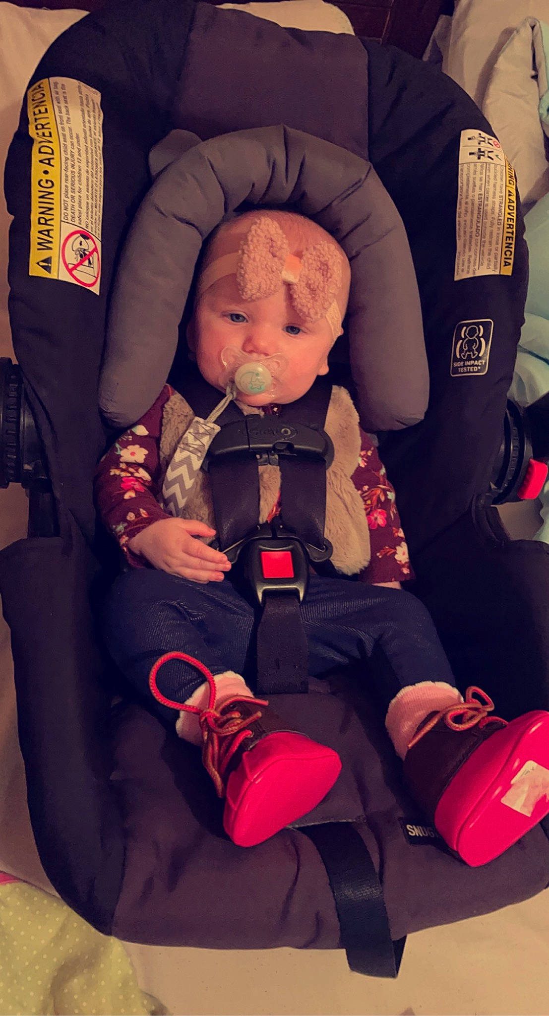 Rilynn joined the competition — help win amazing prizes! baby, baby_carriage, baby_products, baby_sleeping, baby_toddler_clothing, baby_toys, car_seat, carmine, chair, child, comfort, doll, headwear, lap, magenta, person, personal_protective_equipment, pink, plush, sitting