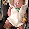 baby, baby_gear, bear_ears, bee_toy, car_seat, child, cozy, fluffy_clothing, hooded_outfit, indoor, infant, pacifier, pink_pants, portrait, safe, seated, sleepy, toy, vehicle, white_socks