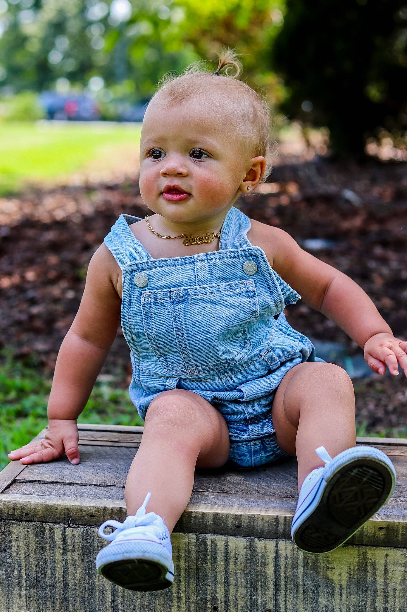 Ariah is registered to the contest to win money with this photo: baby_toddler_clothing, botany, eye, face, facial_expression, footwear, fun, grass, happy, leg, leisure, people_in_nature, person, photograph, plant, shoe, skin, sneakers, summer, toddler