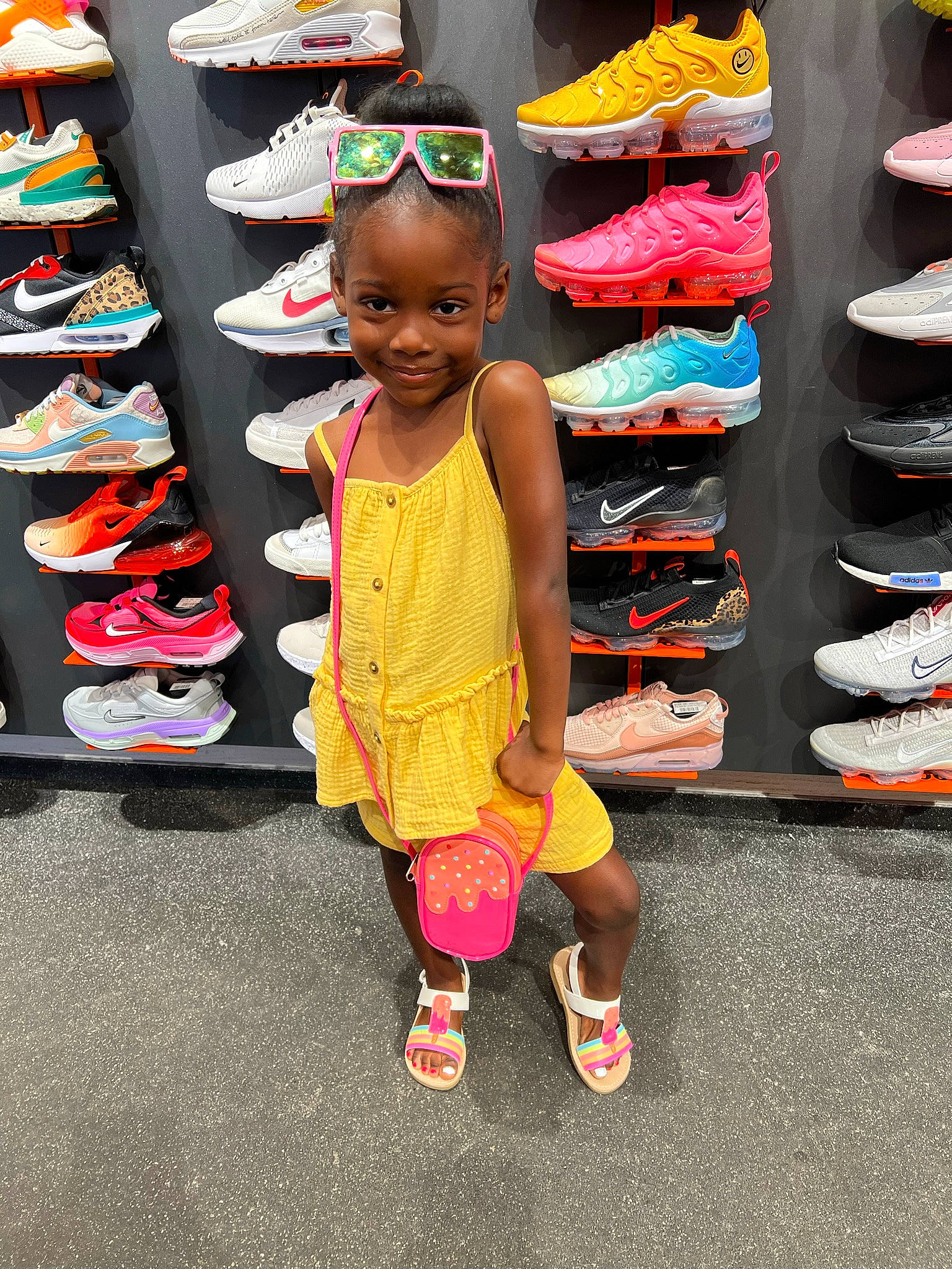 Kyiara joined the competition — help win amazing prizes! bag, boot, cool, eyewear, headgear, human_settlement, joy, magenta, orange, outdoor_shoe, outerwear, person, pink, shelf, shelving, shoe, shoe_store, smile, sneakers, sportswear