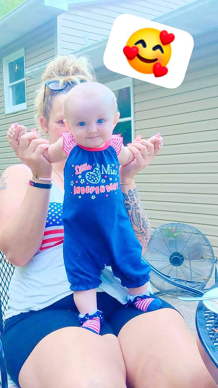 Alayah joined the competition — help win amazing prizes! aqua, azure, baby_toddler_clothing, blue, electric_blue, facial_expression, fun, gesture, hand, happy, leg, organ, person, pink, red, shorts, t_shirt, thigh, toddler, window
