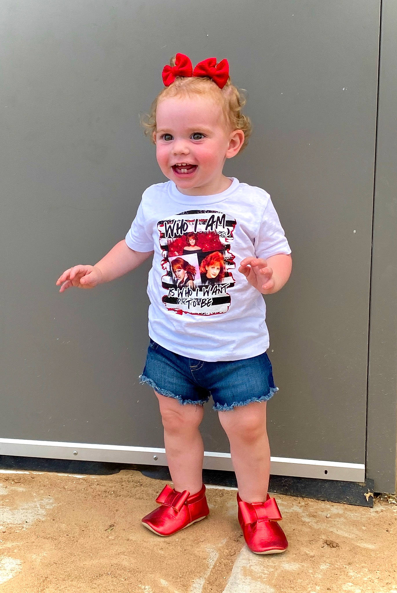 Paityn is registered to the contest to win money with this photo: baby, baby_toddler_clothing, child, child_model, clothing, footwear, hair_accessory, headband, headgear, joy, leg, person, pink, play, shoe, shorts, sleeve, standing, t_shirt, toddler