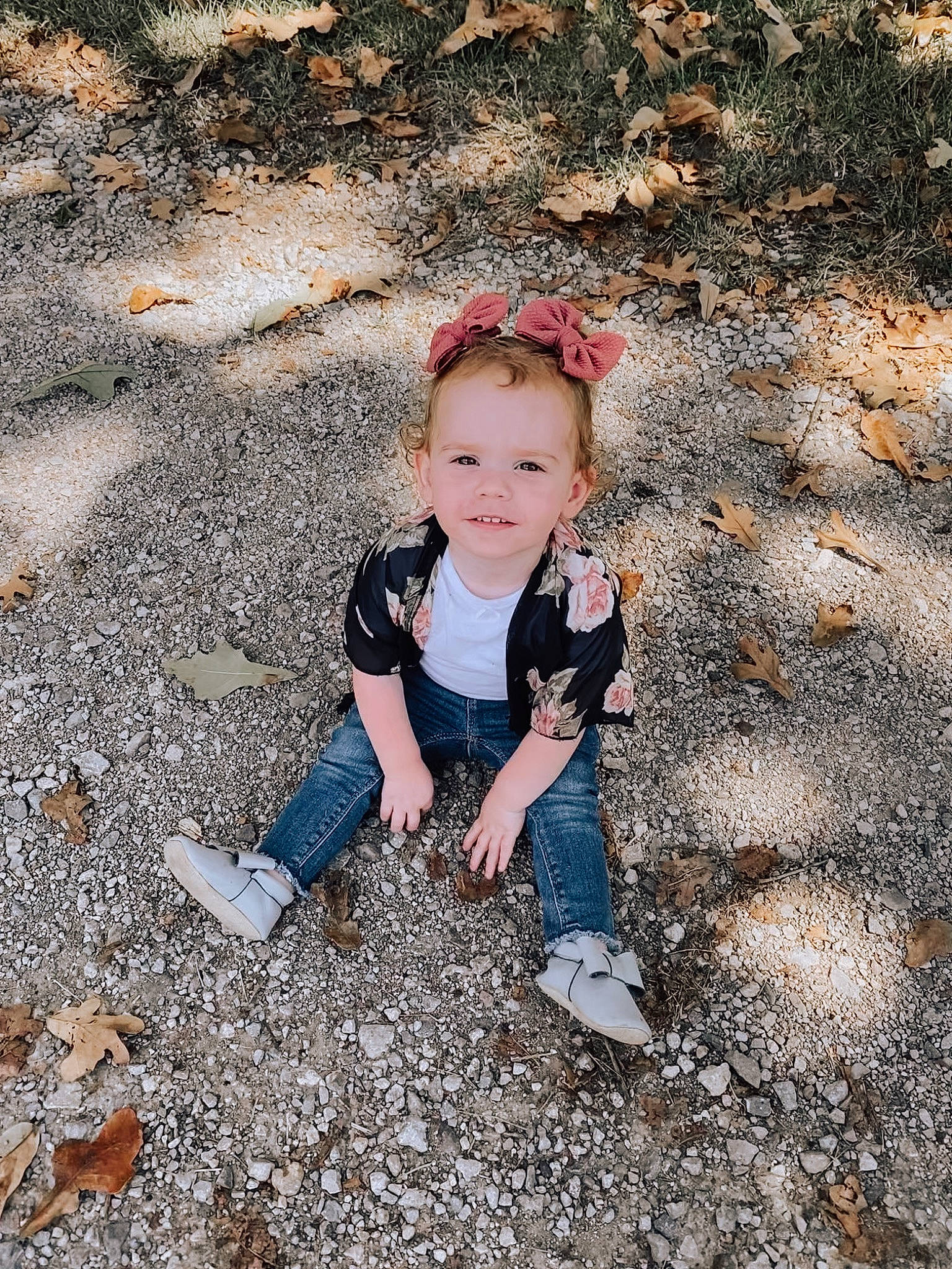 Paityn is registered to the contest to win money with this photo: autumn, child, fawn, fun, joy, leaf, person, photograph, photography, plant, play, rock, sitting, smile, soil, toddler, tree, vacation