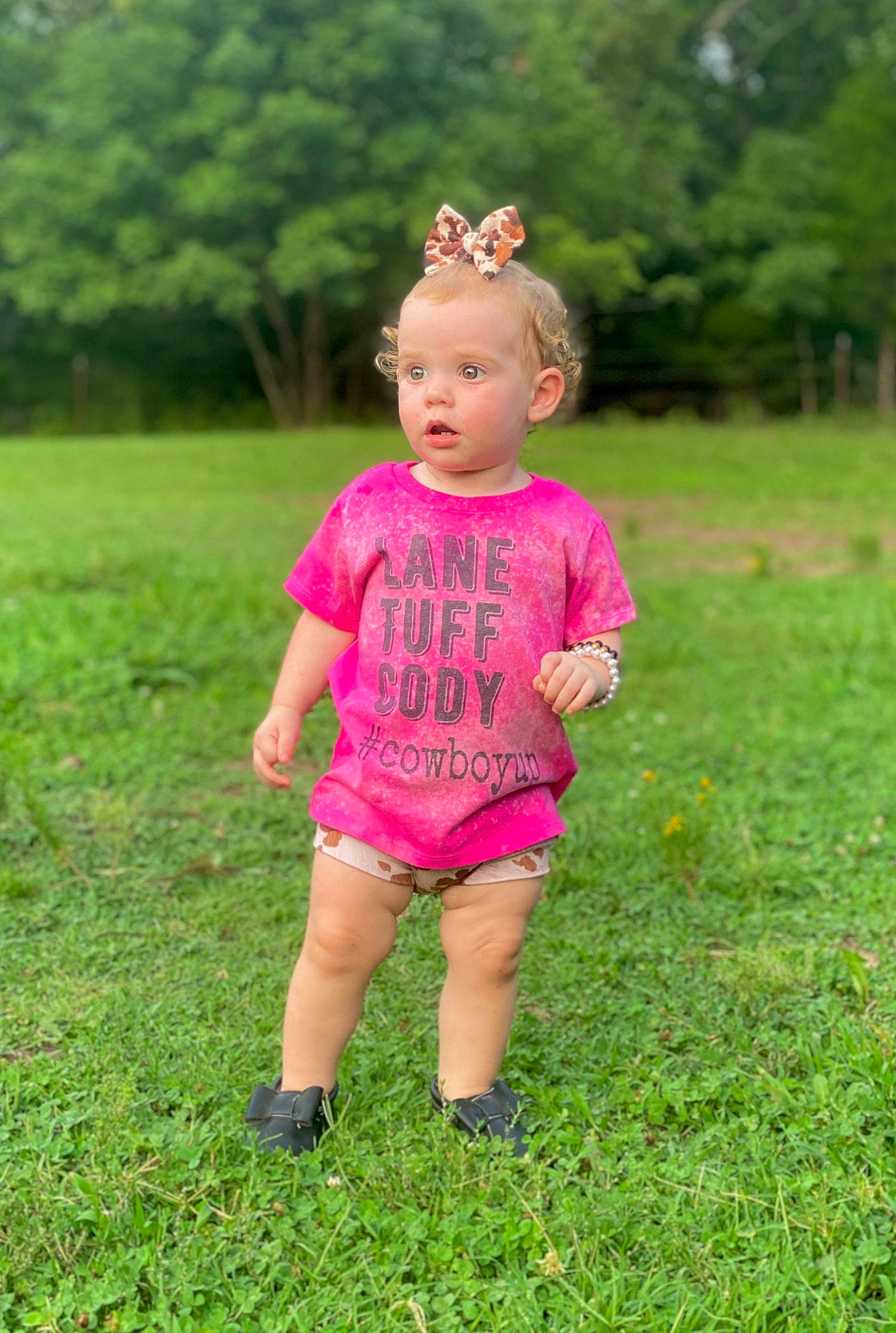 Paityn is registered to the contest to win money with this photo: baby, child, fun, grass, grass_family, grassland, green, happy, lawn, meadow, people_in_nature, person, photography, pink, plant, play, shorts, smile, summer, toddler