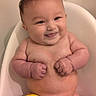 Citlalli joined the competition — help win amazing prizes! baby, bathtub, child, cute, water, smile, skin, towel, happy, indoors, infant, person, plump, chubby, fist, expression, bath, naked, sitting, portrait