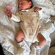 Ivy joined the competition — help win amazing prizes! baby, sleeping, pacifier, blanket, clothing, bambi, infant, newborn, cute, soft, cozy, socks, resting, child, portrait, indoors, peaceful, pink, white, fabric