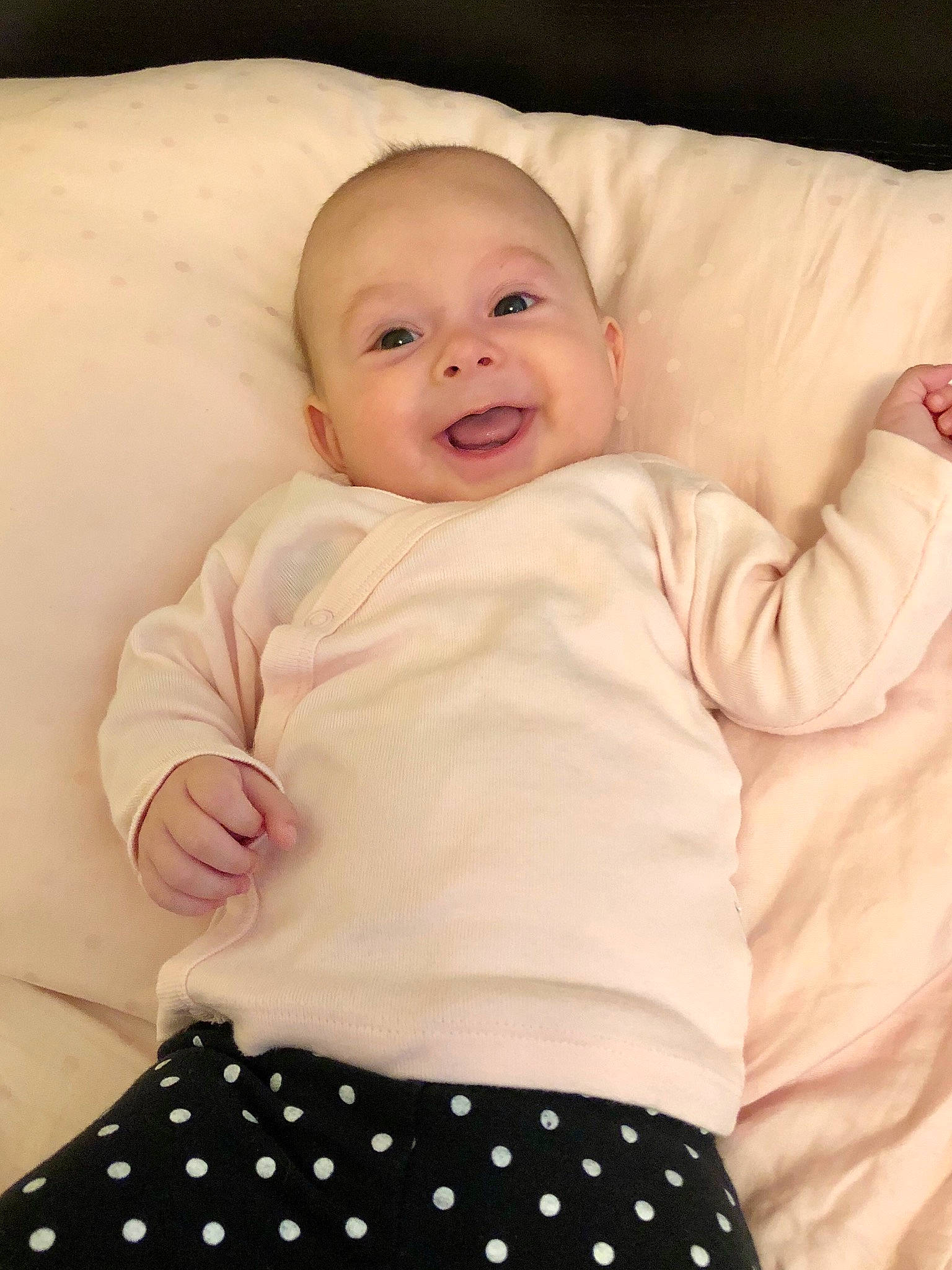 Erika joined the competition — help win amazing prizes! baby, baby_products, baby_sleeping, baby_toddler_clothing, bedding, cheek, child, design, eye, head, linens, pattern, person, polka_dot, product, skin, sleeve, smile, textile, toddler