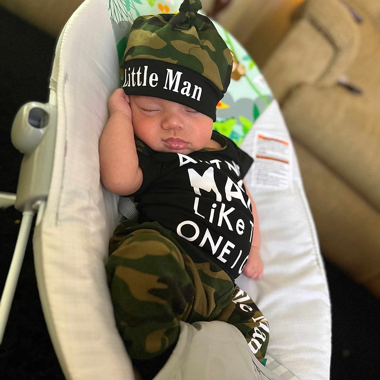 Lachlan is registered to the contest to win money with this photo: baby, baseballcap, bed, cap, clothing, couch, cushion, face, furniture, hat, head, homedecor, newborn, pants, person, photography, pillow, portrait, sleeping, t_shirt
