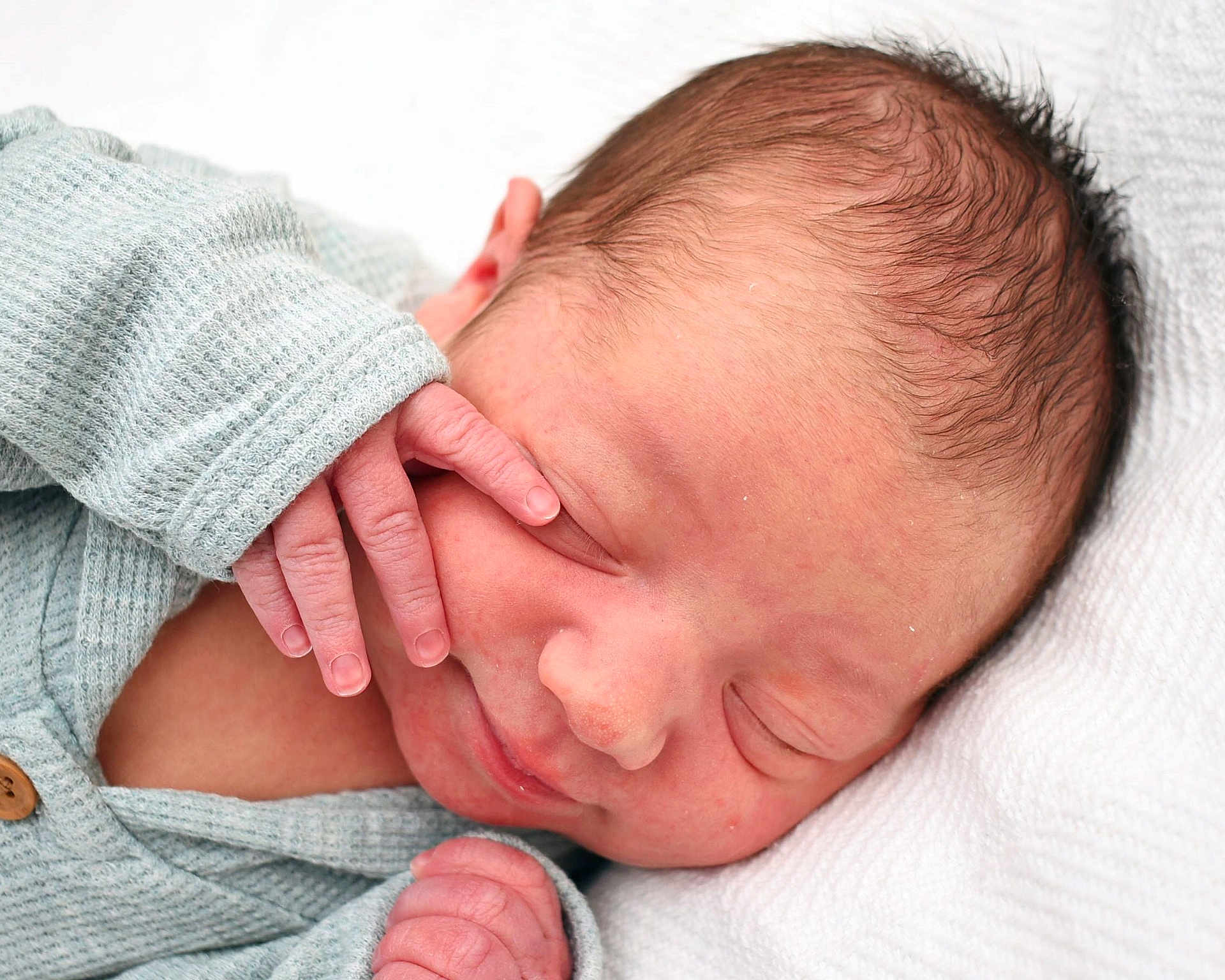 Harlan is registered to the contest to win money with this photo: newborn, baby, sleeping, face, hand, skin, clothing, blanket, infant, closeup, peaceful, soft, texture, resting, cute, portrait, small, delicate, cozy, relaxation