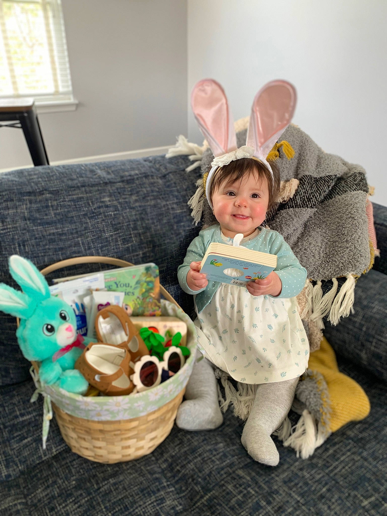 Addison is registered to the contest to win money with this photo: baby, child, comfort, couch, easter, easter_bunny, event, fawn, fun, happy, joy, mammal, person, rabbit, sitting, smile, stuffed_toy, toddler, toy, vertebrate
