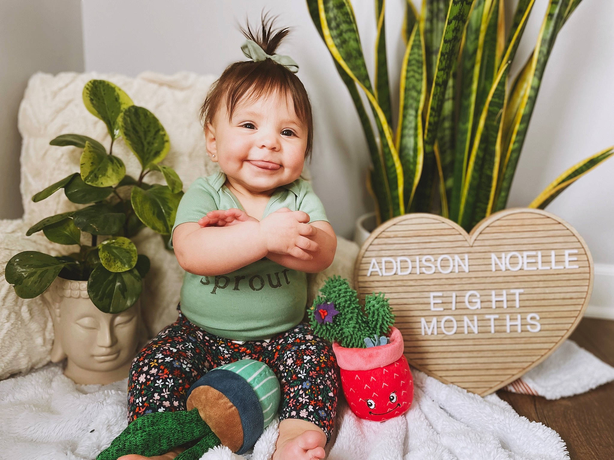Addison joined the competition — help win amazing prizes! baby, baby_toddler_clothing, child, christmas_decoration, christmas_ornament, event, facial_expression, flowerpot, grass, greeting, happy, joy, leaf, organ, ornament, people_in_nature, person, plant, product, smile