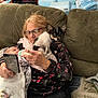 baby, blanket, bottle_feeding, chihuahua, couch, cozy, curious, dog, elderly_woman, family, feeding, glasses, holding, home, indoor, pajamas, pet, portrait, sitting, smartphone