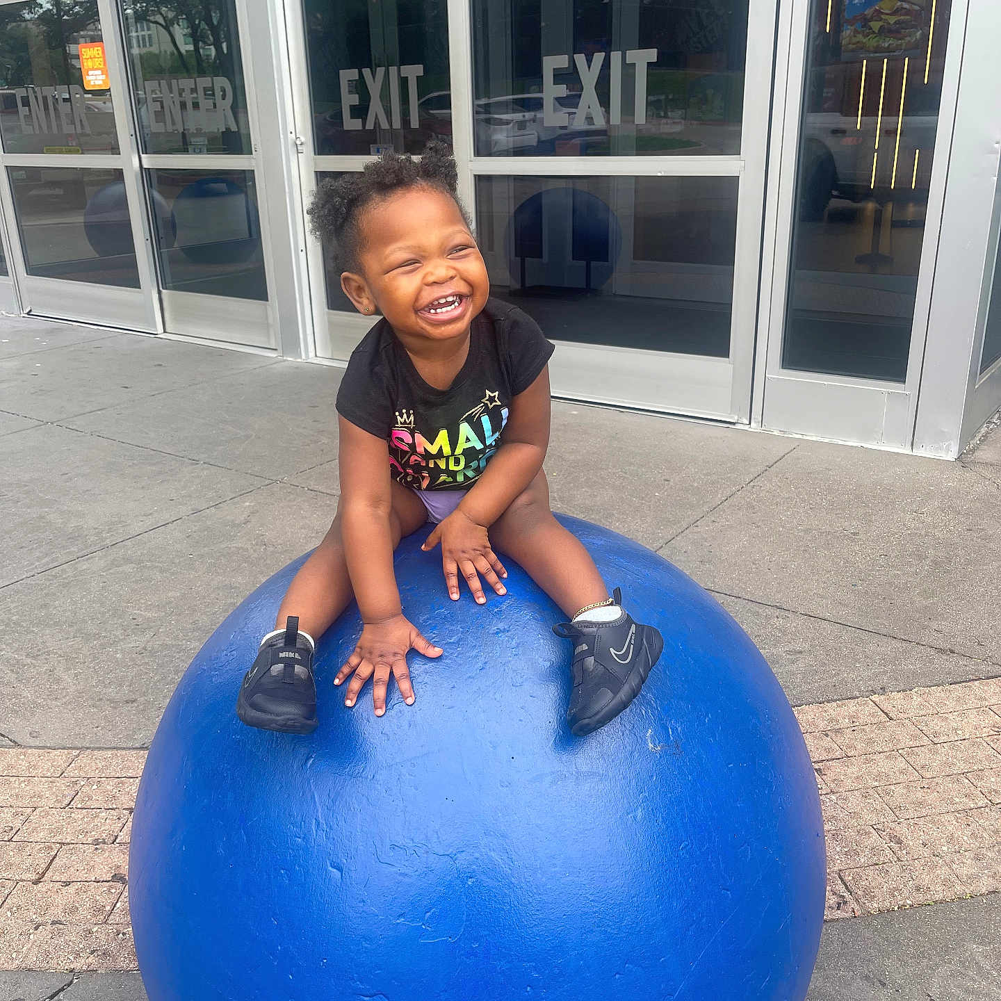 Lillianna is registered to the contest to win money with this photo: architecture, ball, building, burger, child, door, face, female, football, girl, head, outdoors, person, photography, portrait, shelter, soccer, soccerball, sphere, sport