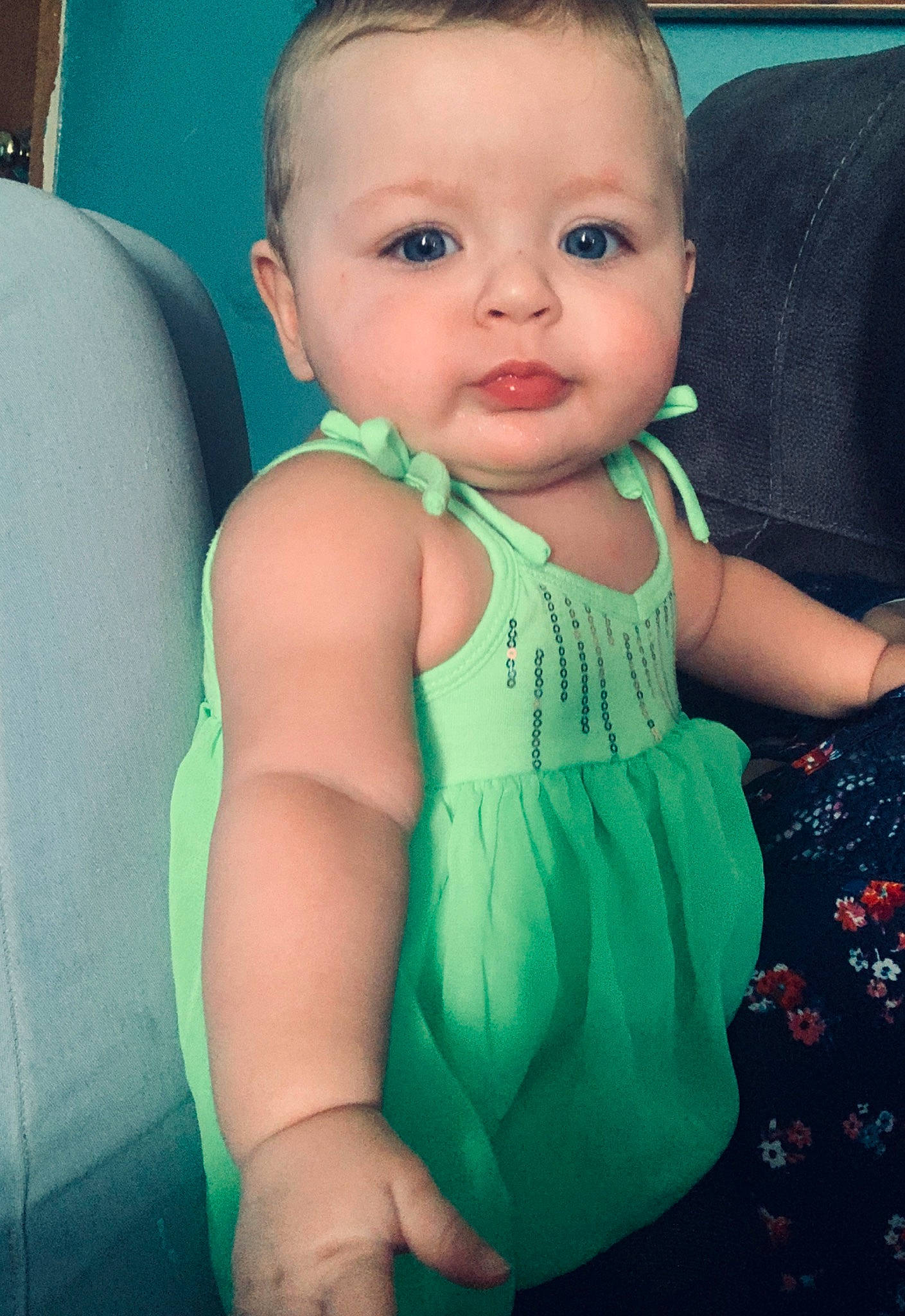 Rayna is registered to the contest to win money with this photo: baby, baby_toddler_clothing, cheek, child, eye, face, green, head, iris, lip, nose, person, sitting, skin, smile, toddler