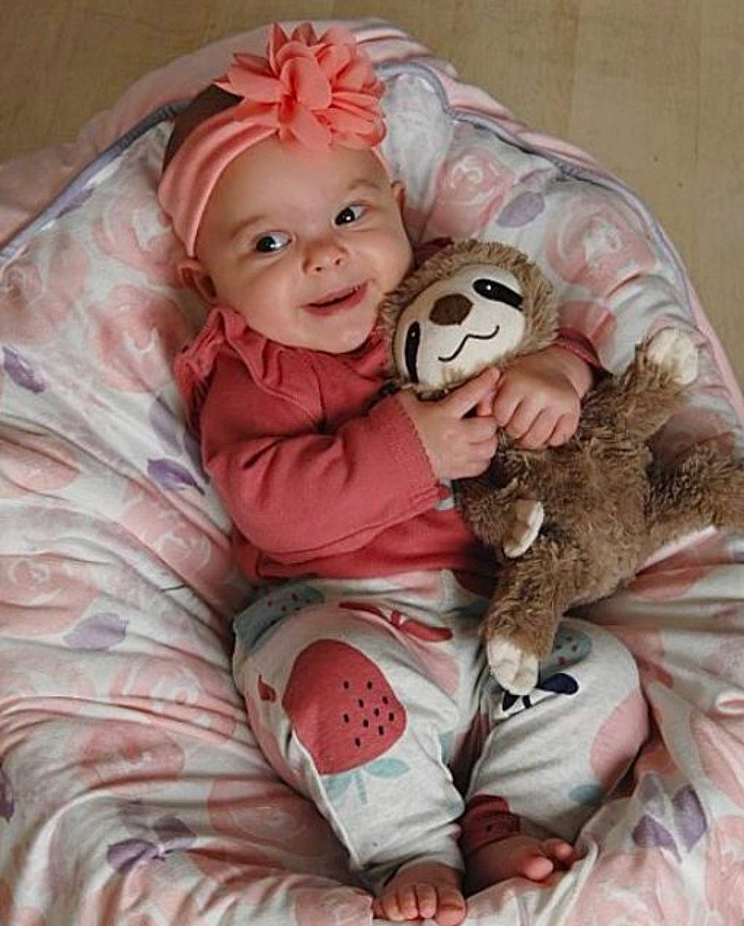 Megan joined the competition — help win amazing prizes! baby, baby_toddler_clothing, child, comfort, doll, football, happy, headwear, linens, mammal, person, pink, plush, skin, smile, soccer_ball, stuffed_toy, teddy_bear, textile, toddler