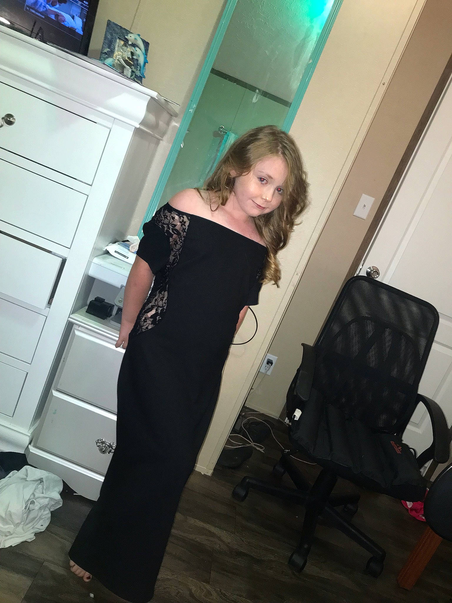 Peggy joined the competition — help win amazing prizes! cabinetry, chair, door, drawer, event, fashion, fashion_design, flash_photography, flooring, formal_wear, hairstyle, human_leg, knee, long_hair, person, shoulder, sleeve, standing, thigh, trunk